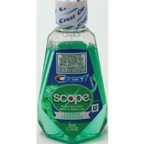 Scope Mouthwash Original Mint C01-0214501-8200 - 1.2 fl. oz. travel size mouthwash in plastic bottle.