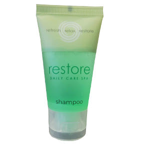 Dial® Restore Daily Care Spa Shampoo C03-0114000-8100-1 fl. oz. travel size bottle of shampoo.