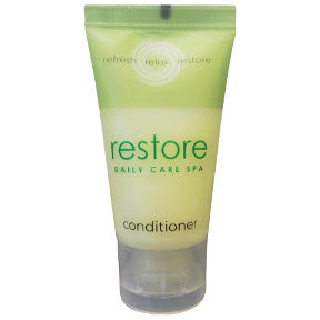 Dial® Restore Daily Care Spa Conditioner C03-0214001-8100-1 fl. oz. travel size bottle of conditioner.